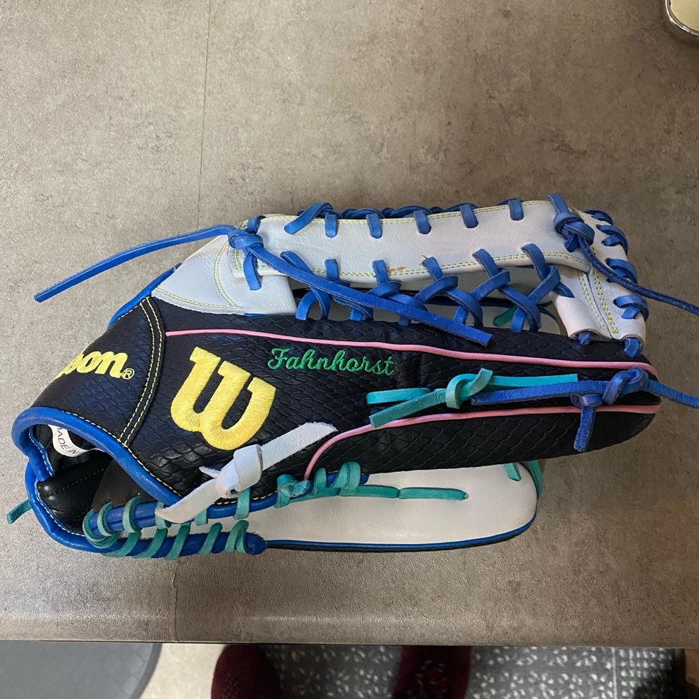 custom Wilson A2000. has last name on in FAHNHORST in cursive.